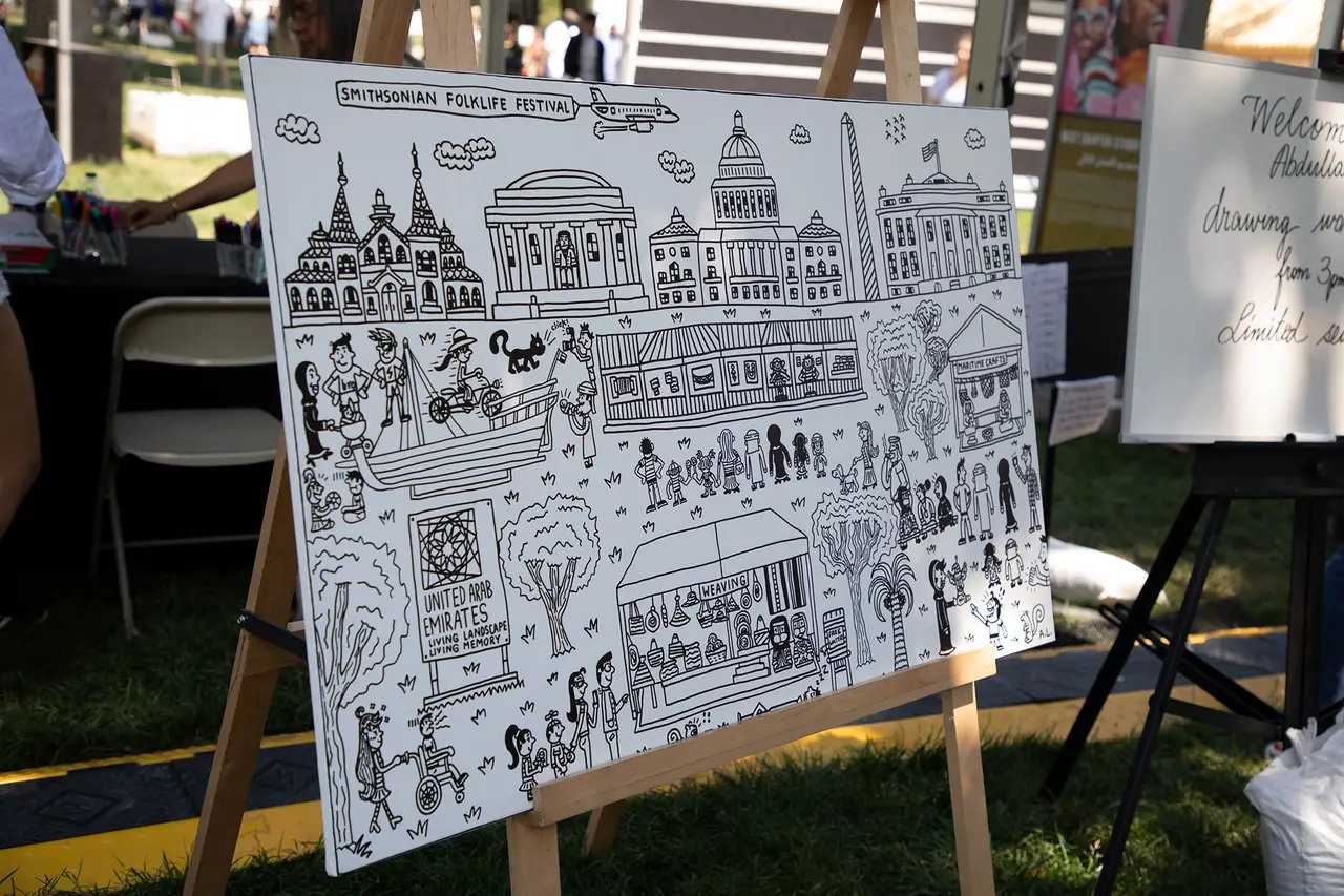 Black-and-white line drawing of the Smithsonian Folklife Festival